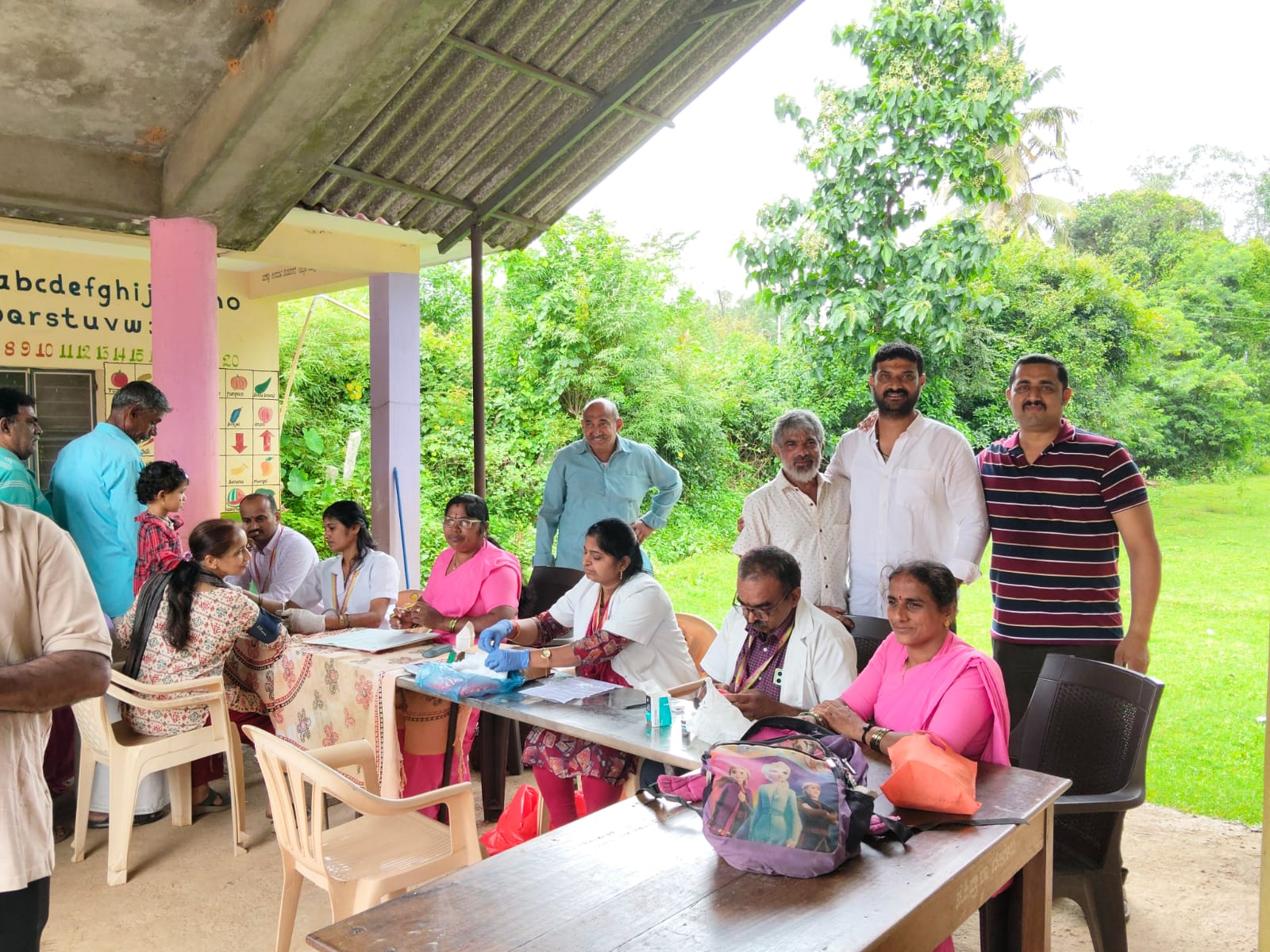 Healthcare professionals and community members at a rural health camp