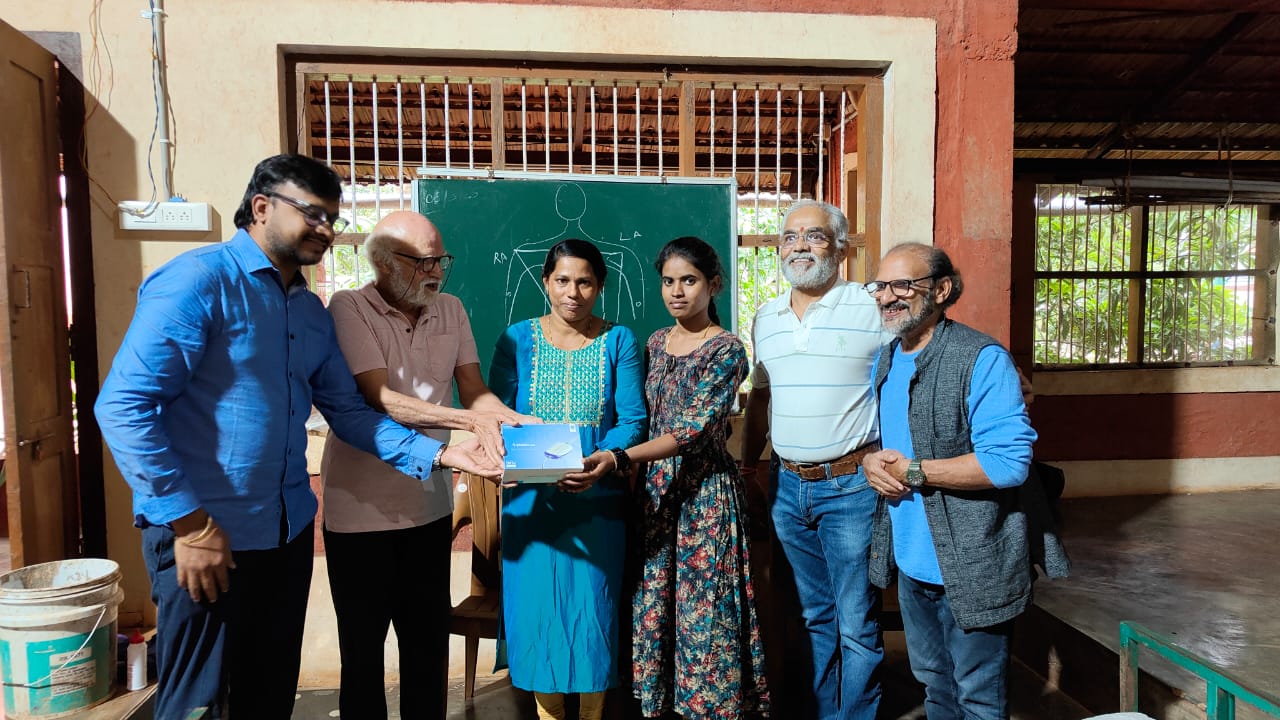 Community members receiving healthcare equipment after a training session